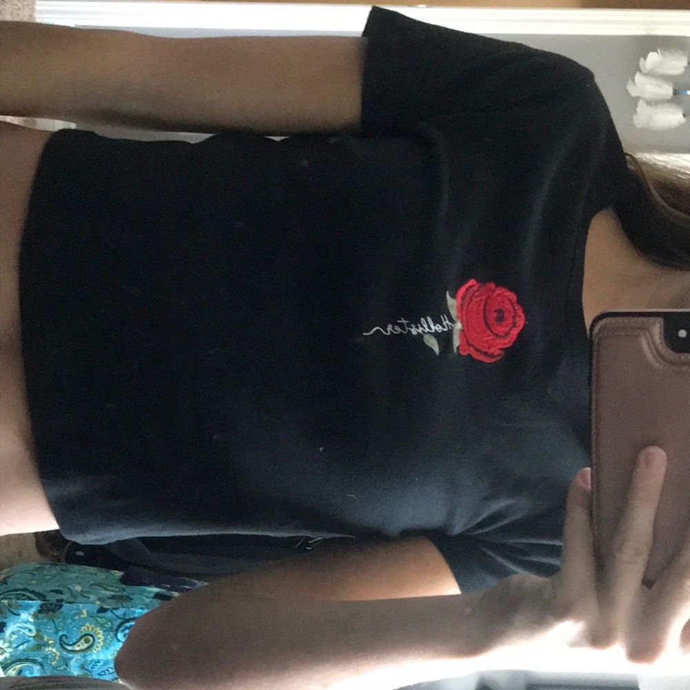Black crop top with rose stitch at the front